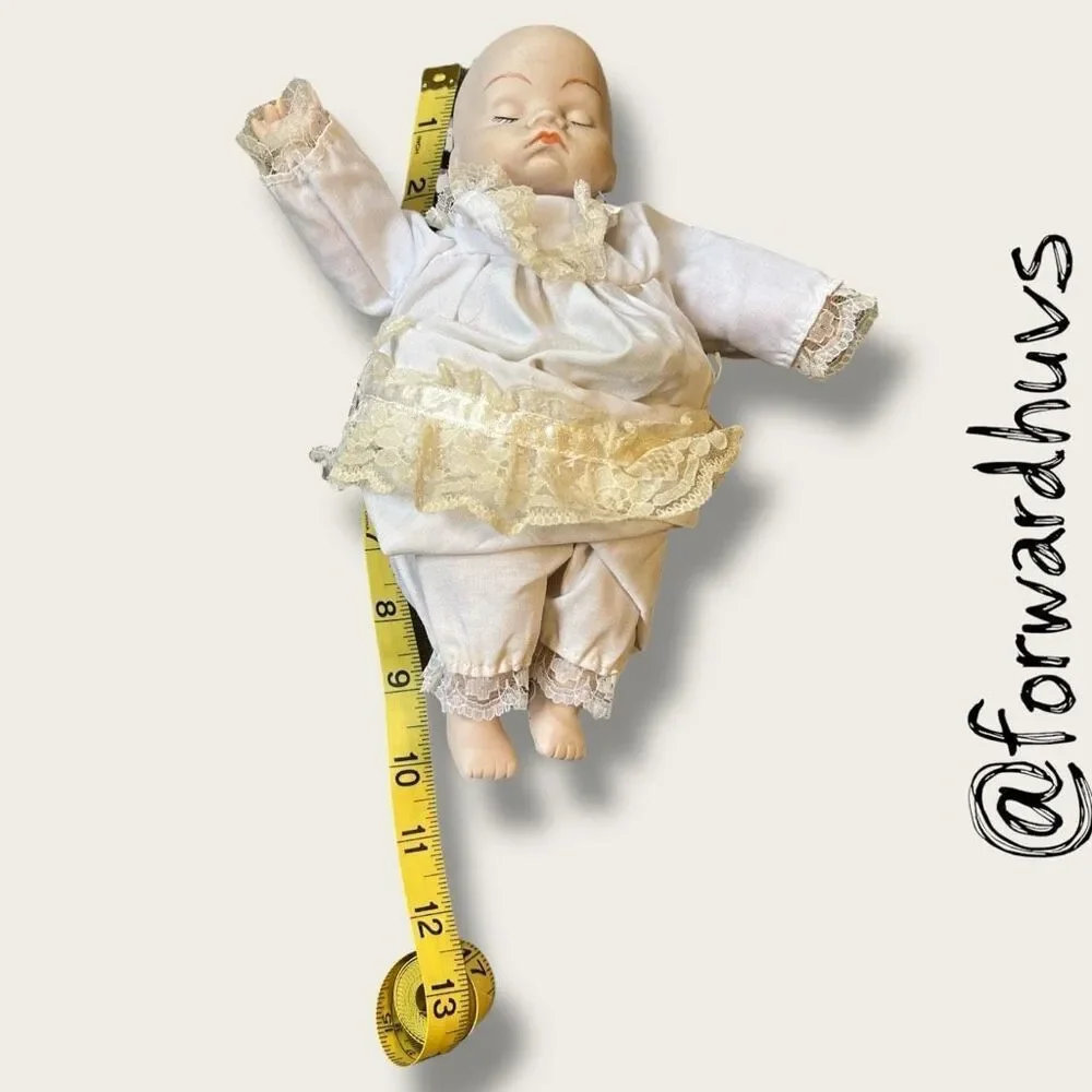 Wind-Up Musical Porcelain Doll – Moving Head & Arms - UNKNOWN AGE